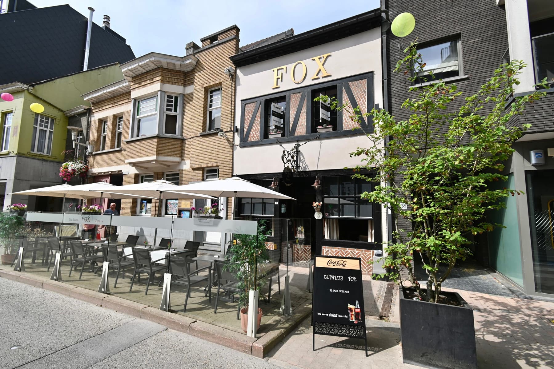 Karaktervolle handelswoning met woonst op toplocatie in het centrum van Deinze